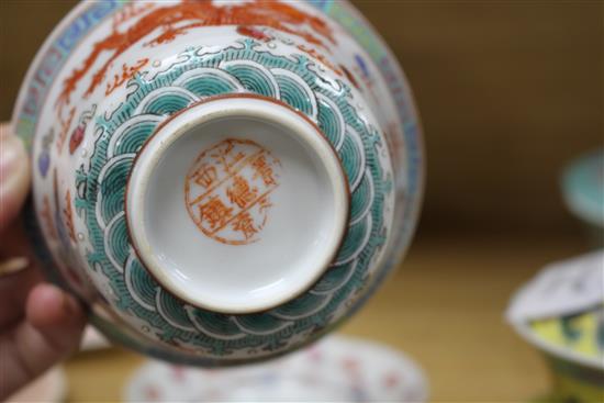 Five Chinese porcelain rice bowls, covers and stands, together with two spoons, second half 20th century, bowls 10.5cm diameter